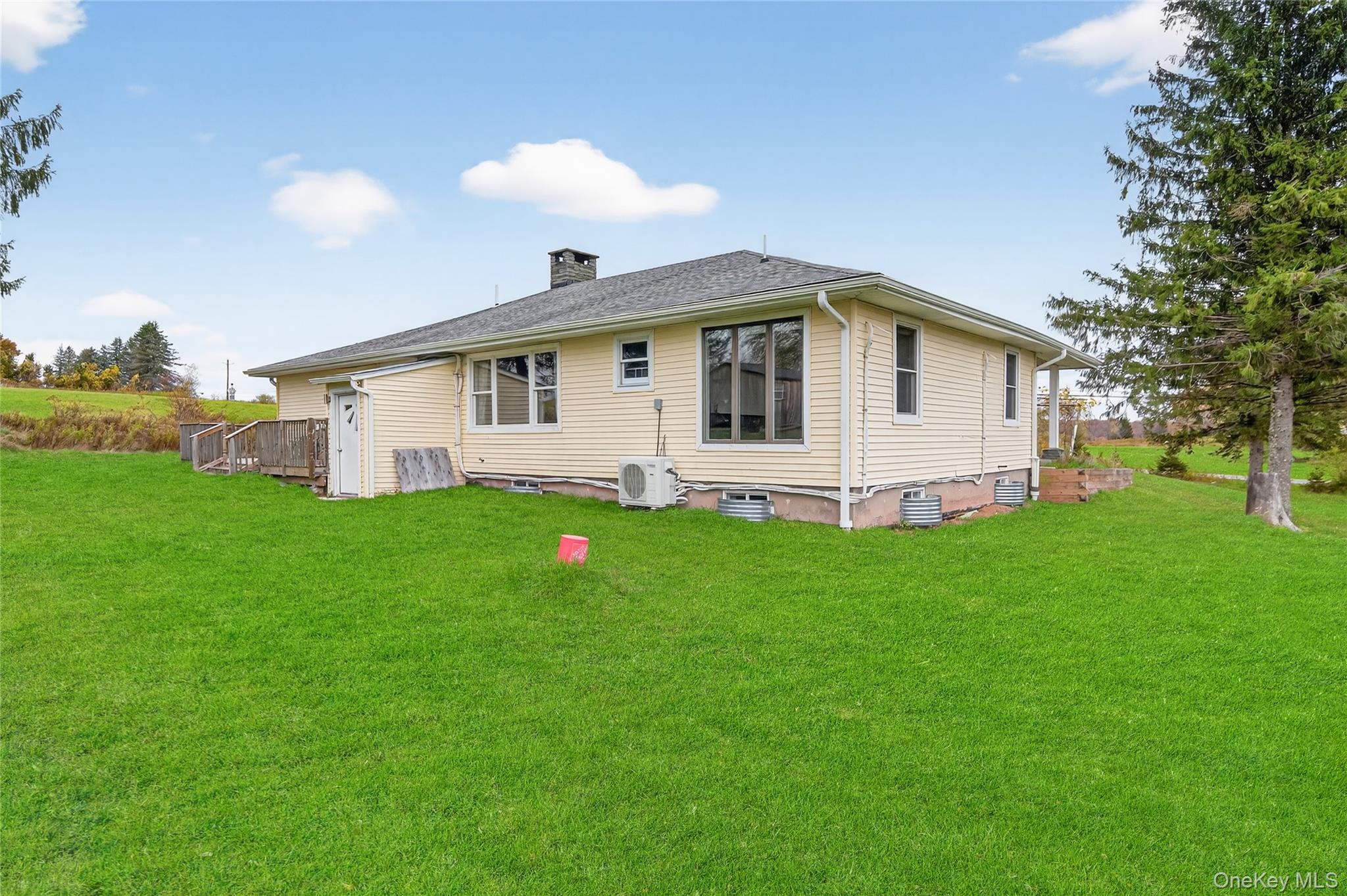6049 State Rte 55 Liberty, NY 12754 - Photo 39 of 50 a front view of house with yard and green space