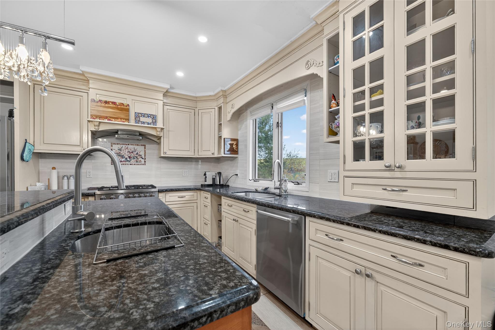 6049 State Rte 55 Liberty, NY 12754 - Photo 8 of 50 a kitchen with a sink stove and microwave