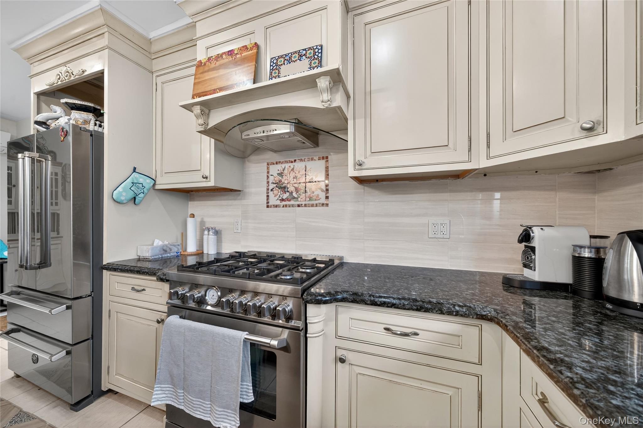 6049 State Rte 55 Liberty, NY 12754 - Photo 9 of 50 a kitchen with stainless steel appliances granite countertop a stove and a sink