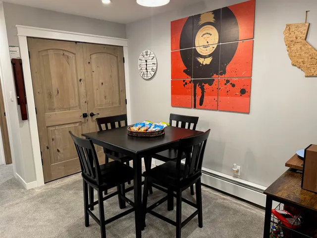 a view of a table and chairs in a room