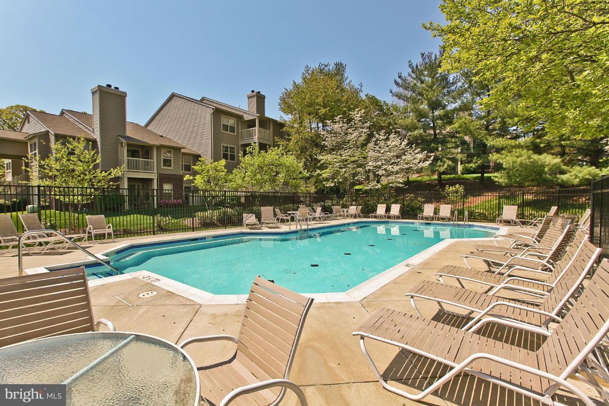 1785 Jonathan Way, Unit B Reston, VA 20190 - Photo 14 of 26 a view of a swimming pool with a patio