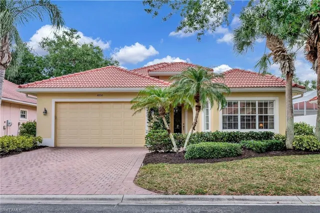 $695,000 | 4850 Europa Drive, Naples, FL 34105