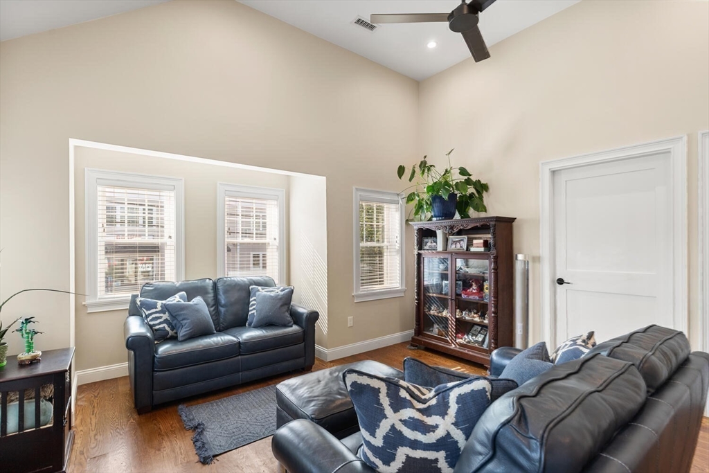23 Locust Street, Unit 2 Danvers, MA 01923 - Photo 12 of 32 a living room with furniture and a window
