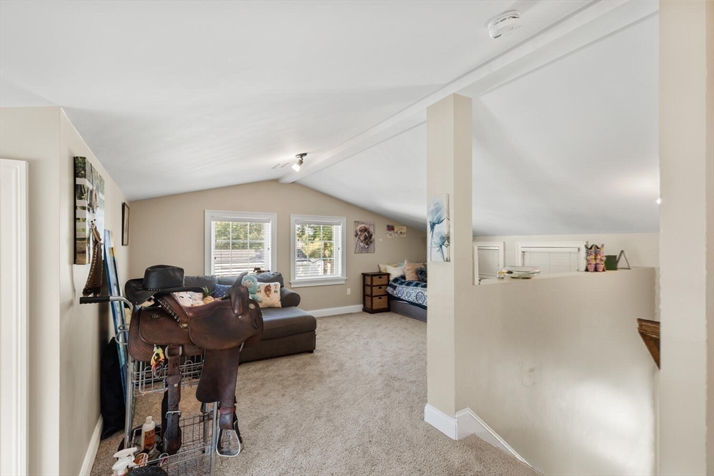 23 Locust Street, Unit 2 Danvers, MA 01923 - Photo 23 of 32 a view of a livingroom with furniture and a window