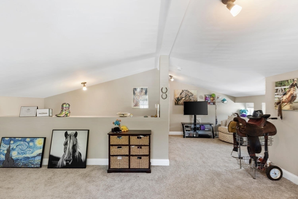 23 Locust Street, Unit 2 Danvers, MA 01923 - Photo 25 of 32 a view of a room with gym equipment