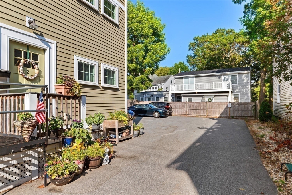 23 Locust Street, Unit 2 Danvers, MA 01923 - Photo 30 of 32 a view of a house with patio