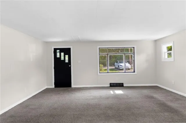 an empty room with windows