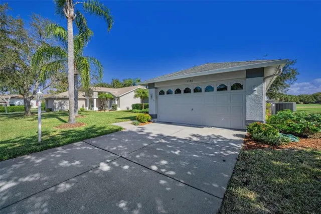 a living room with furniture or couch and a rug
