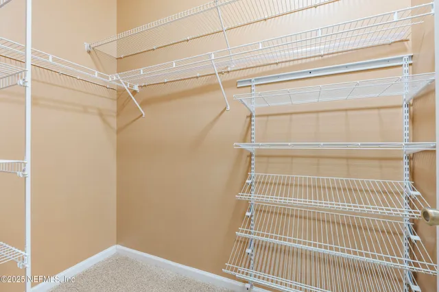 a view of a room with racks on the wall