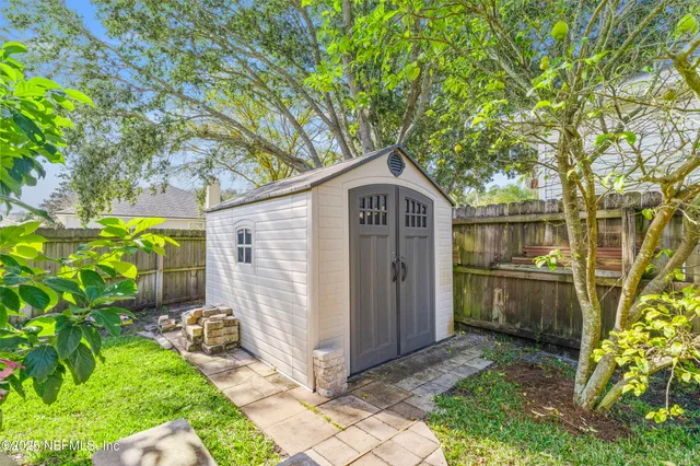 a view of a backyard with a garden