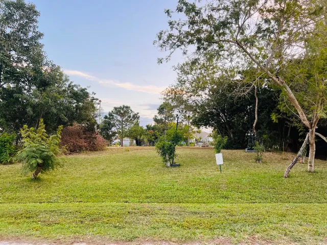 a view of swimming pool with a yard