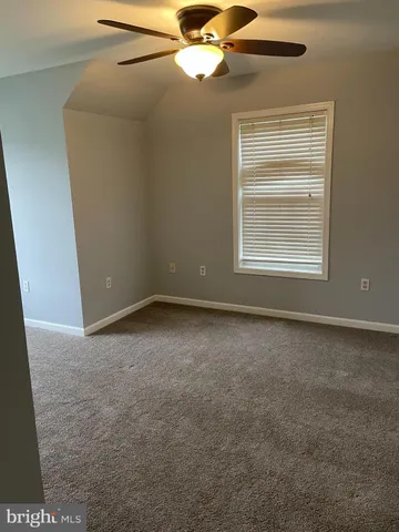 a view of a livingroom with a fan