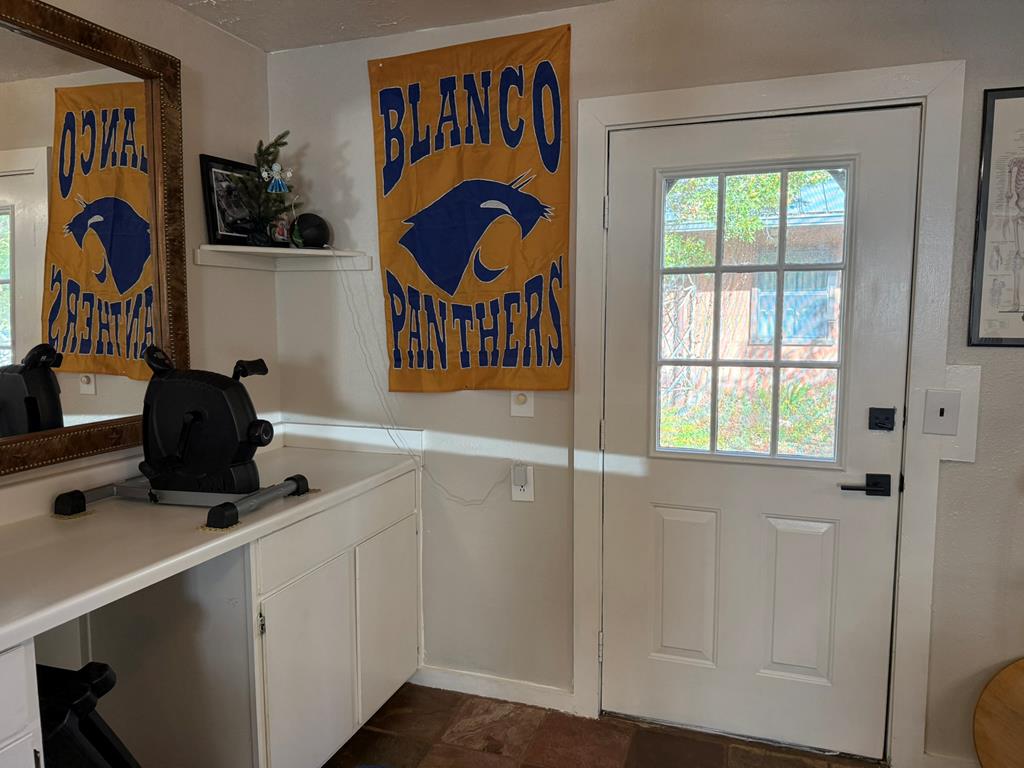 11 Main Street Blanco, TX 78606 - Photo 8 of 15 a bathroom with a sink and a mirror