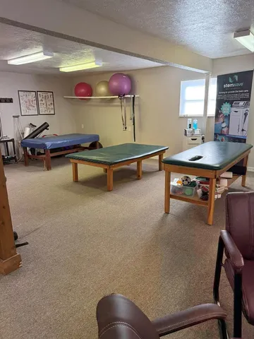 a room with furniture and window