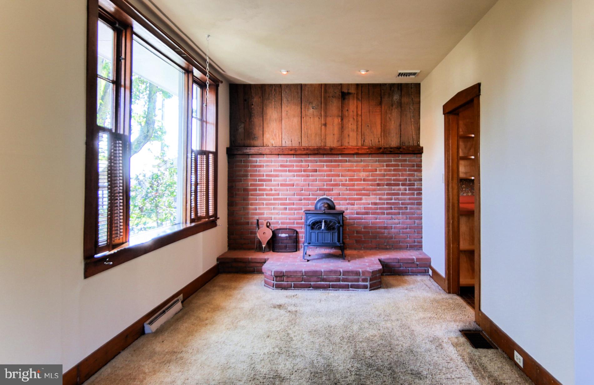 1212 Mount Joy Road Manheim, PA 17545 - Photo 13 of 24 Living Room w/Wood Stove