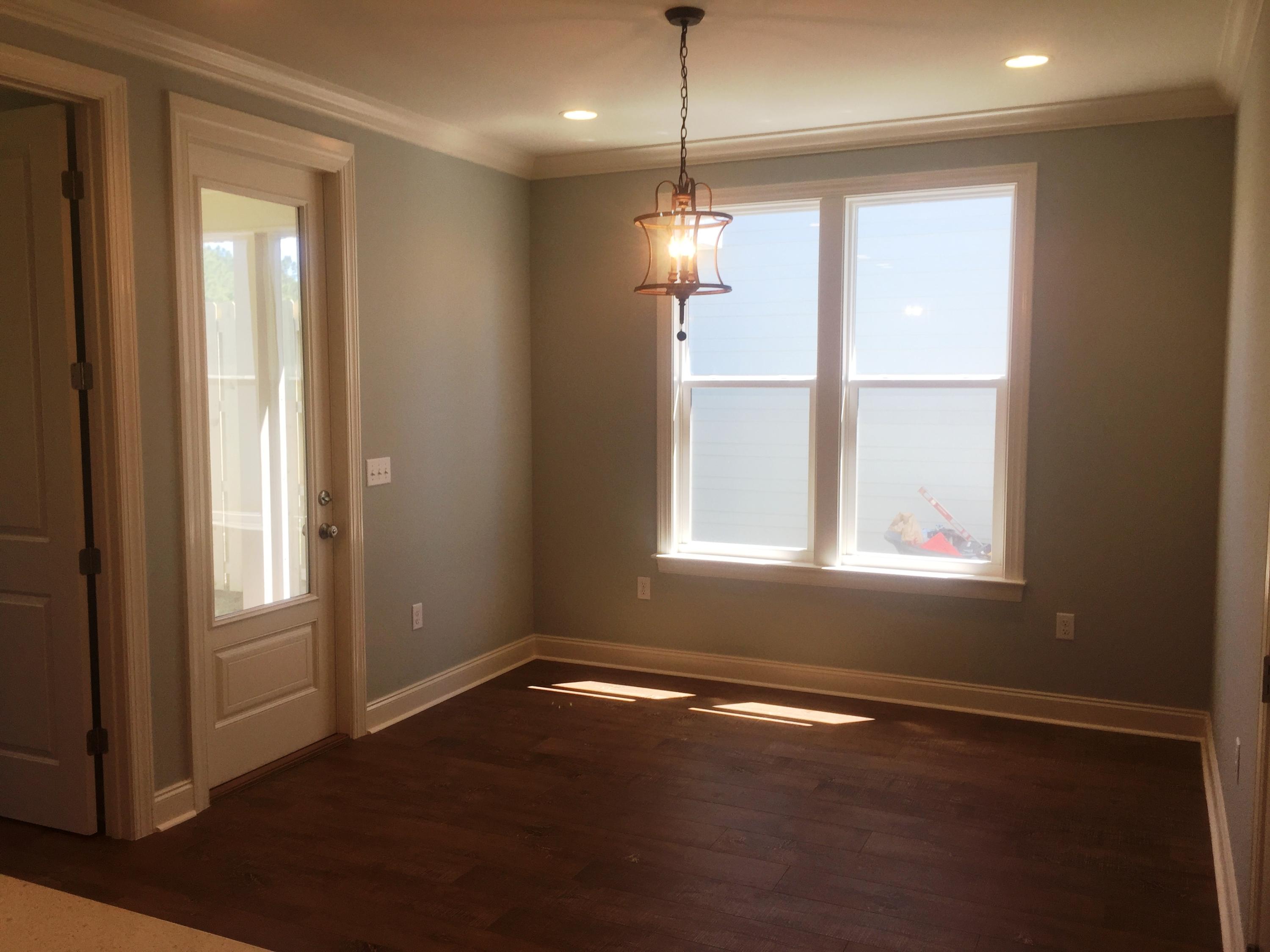 167 North Zander Way Santa Rosa Beach, FL 32459 - Photo 13 of 30 a view of an empty room with a window and chandelier