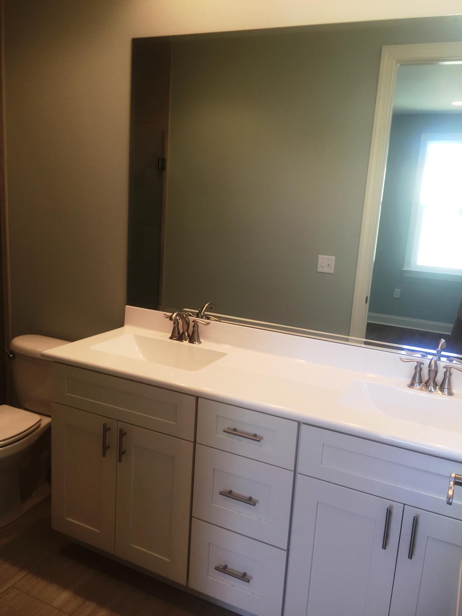 167 North Zander Way Santa Rosa Beach, FL 32459 - Photo 19 of 30 a bathroom with a sink and a mirror