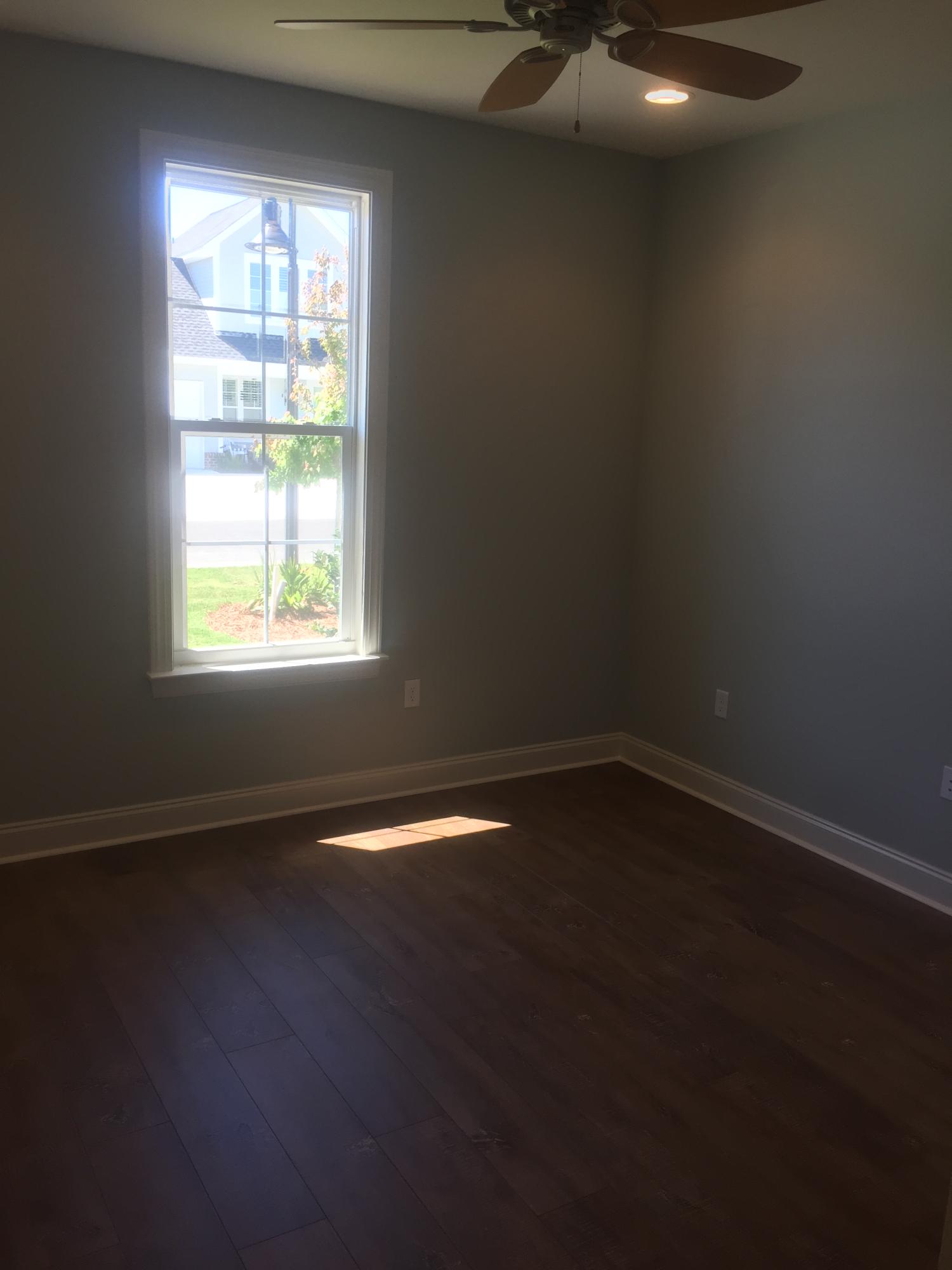 167 North Zander Way Santa Rosa Beach, FL 32459 - Photo 20 of 30 a view of an empty room with wooden floor and a window
