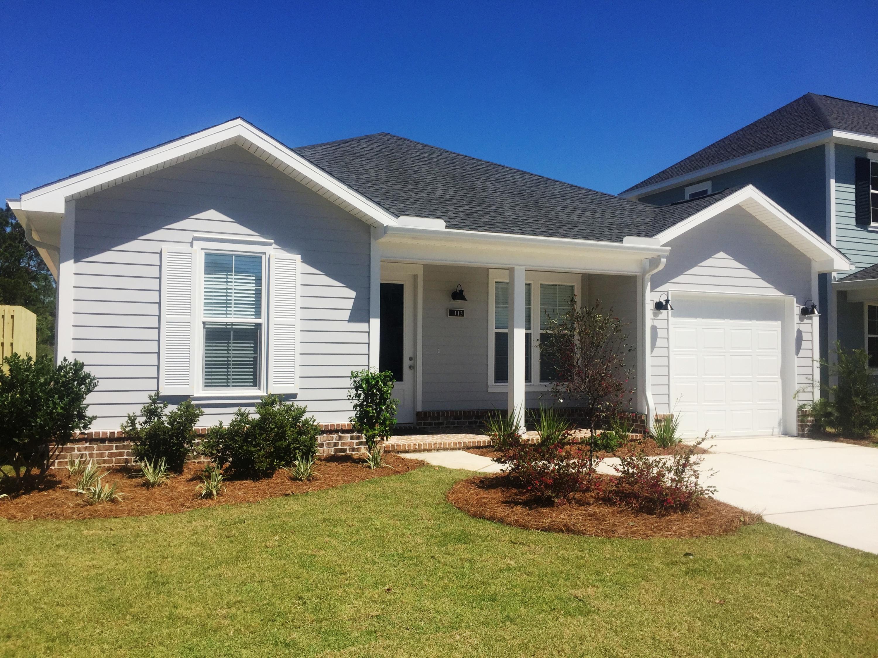 167 North Zander Way Santa Rosa Beach, FL 32459 - Photo 10 of 30 a front view of a house with a yard