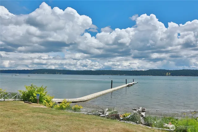 a view of a lake with a big yard