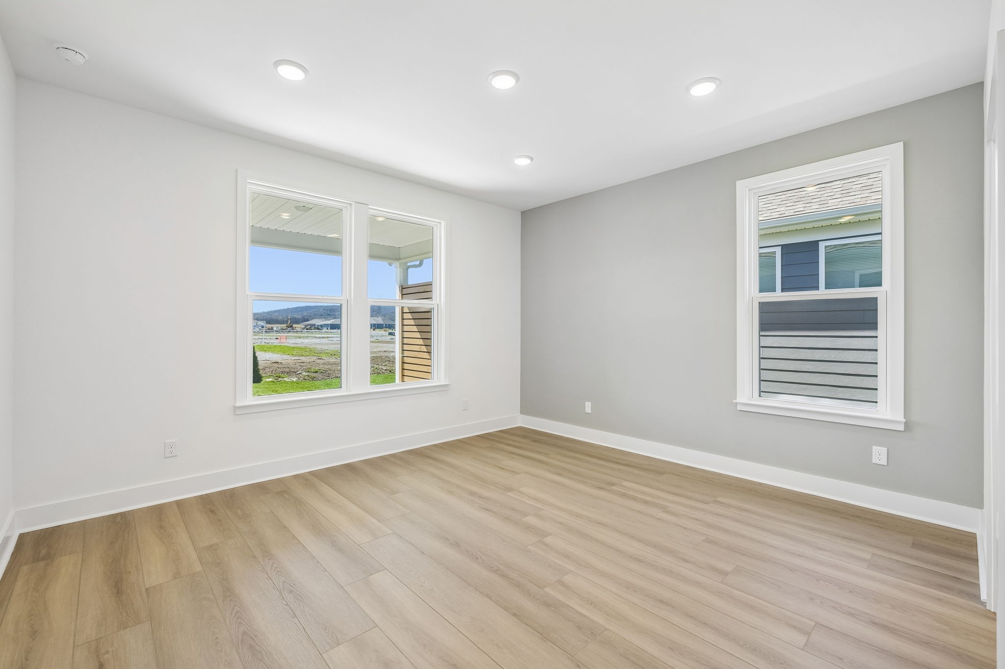 519 Scarlet Oak Road Lebanon, TN 37090 - Photo 22 of 51 a view of an empty room with wooden floor and a window