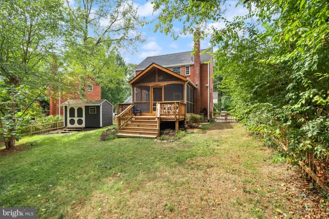 a view of a chairs and table in the balcony