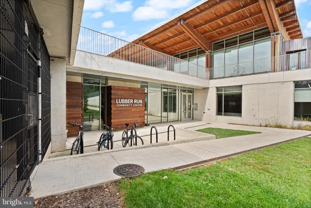 a view of a building with building and traffic signal