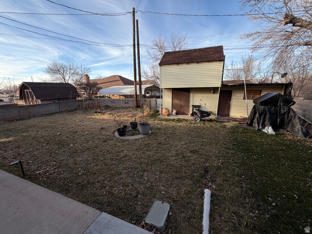 574 West Harding Avenue Cedar City, UT 84720 - Photo 35 of 43 Fenced backyard with a patio and shed