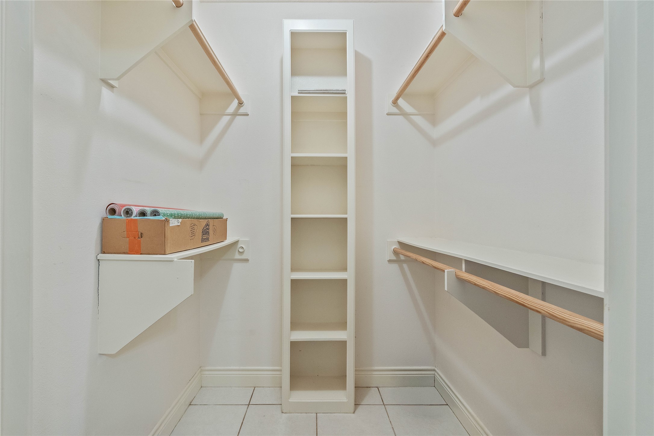 600 Hughes Loop Willis, TX 77378 - Photo 23 of 50 a view of an empty walk in closet