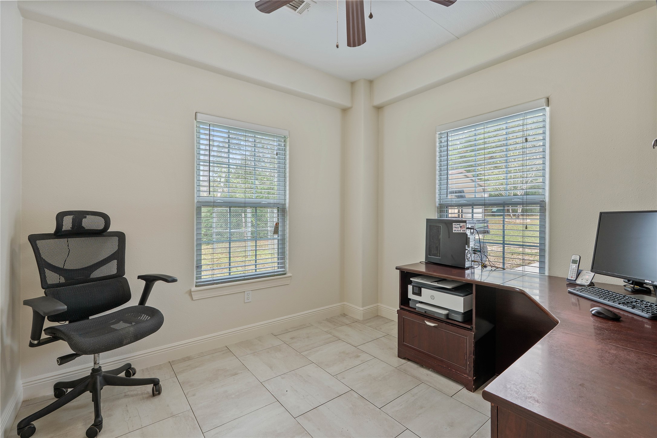 600 Hughes Loop Willis, TX 77378 - Photo 28 of 50 a view of a workspace with furniture and a window