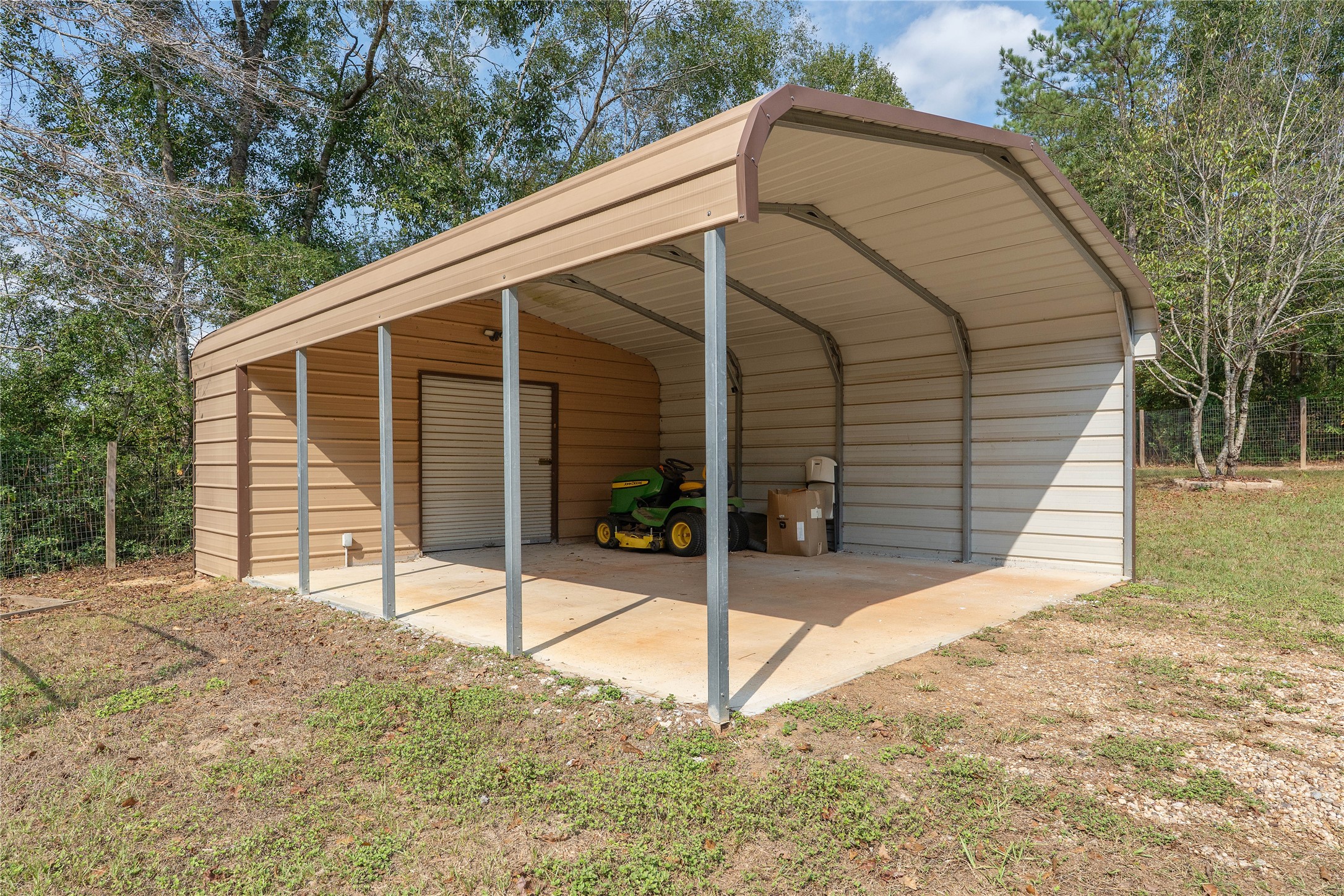 600 Hughes Loop Willis, TX 77378 - Photo 36 of 50 a view of a house with a backyard