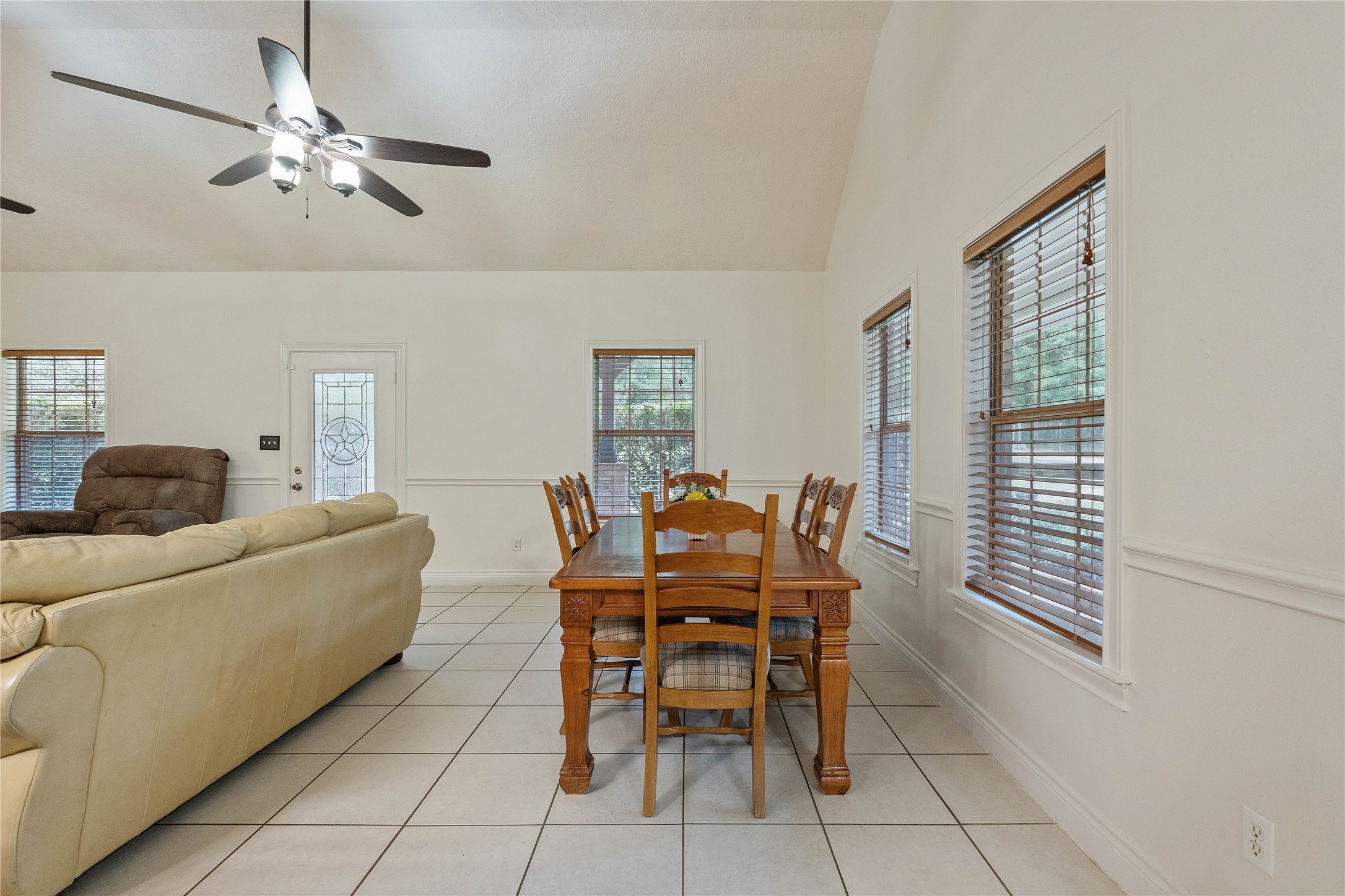 600 Hughes Loop Willis, TX 77378 - Photo 10 of 50 a living room with furniture and a window