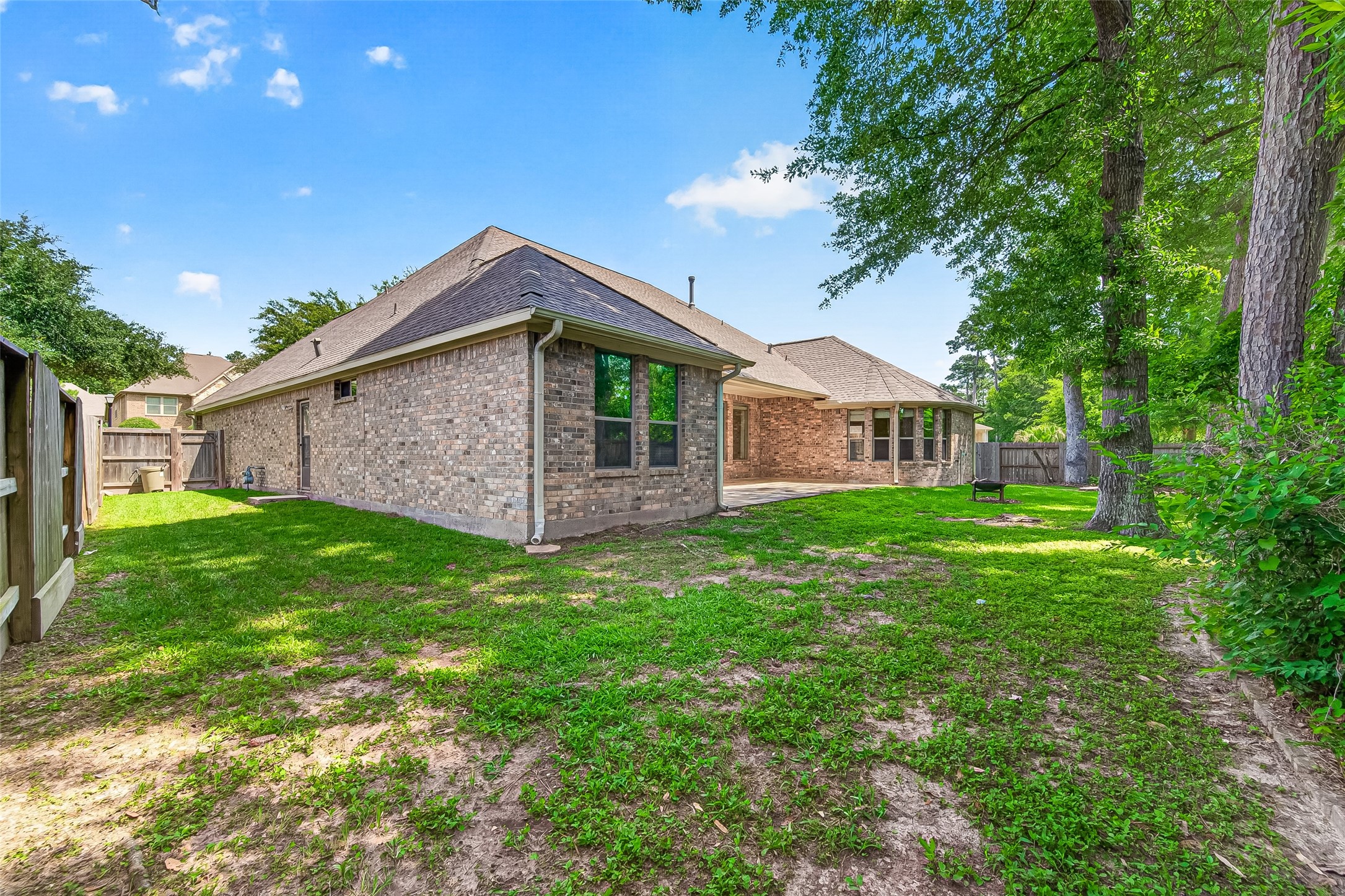 2310 Spring Lake Park Lane Spring, TX 77386 - Photo 45 of 47 a front view of a house with a garden