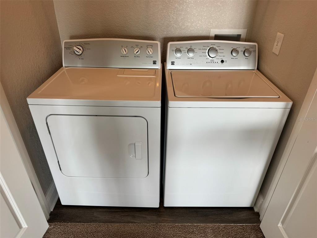 2420 Ann Rou Road, Unit 201 Tavares, FL 32778 - Photo 5 of 25 a close up view of washer and dryer