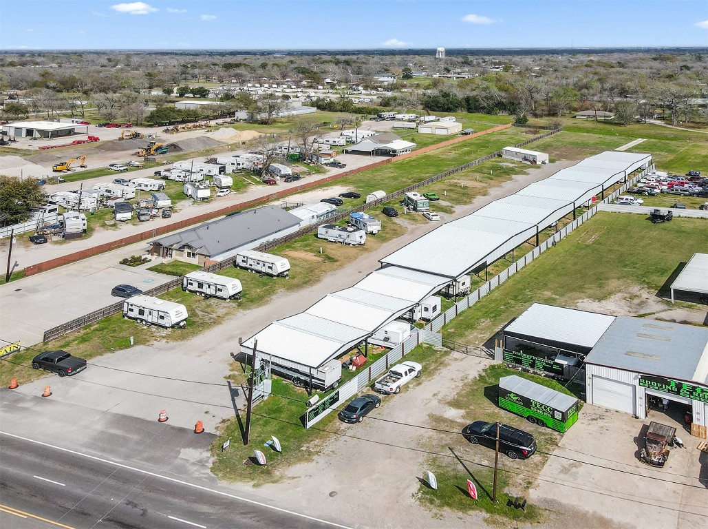 621 South Main Street Highlands, TX 77562 - Photo 3 of 7 an aerial view of residential houses with outdoor space