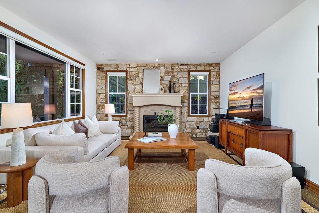 6591 Halite Place Carlsbad, CA 92009 - Photo 13 of 33 a living room with furniture and a fireplace