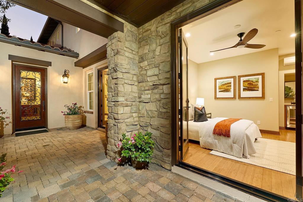 6591 Halite Place Carlsbad, CA 92009 - Photo 2 of 33 a living room with furniture and a potted plant