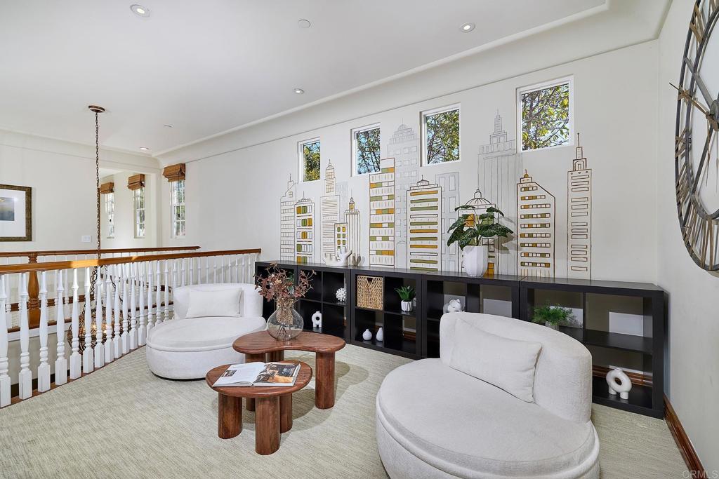 6591 Halite Place Carlsbad, CA 92009 - Photo 29 of 33 a living room with furniture and white walls