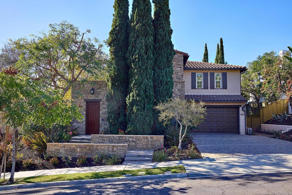 6591 Halite Place Carlsbad, CA 92009 - Photo 4 of 33 a front view of a house with garden
