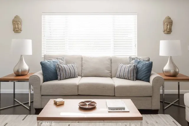 a living room with a couch and a table