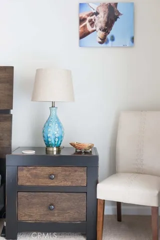 a view of room with furniture and wooden floor
