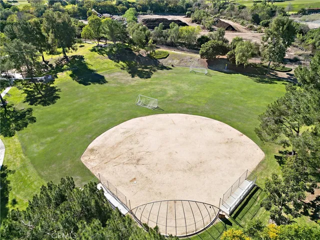 an aerial view of a house with a garden