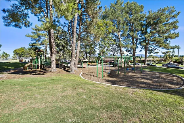 a view of a park with swings