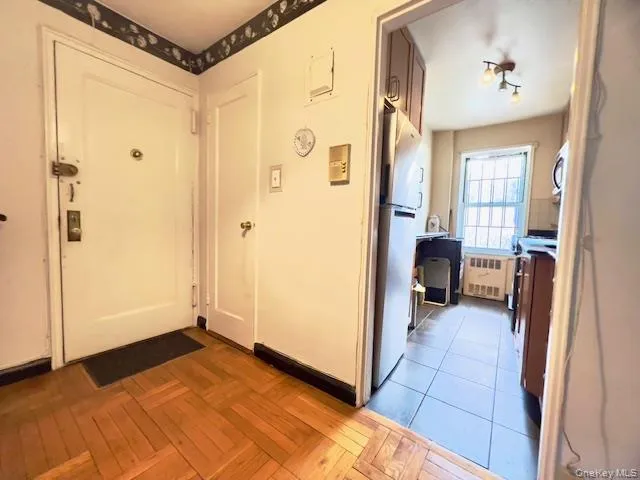 a view of a bedroom with a furniture and hallway