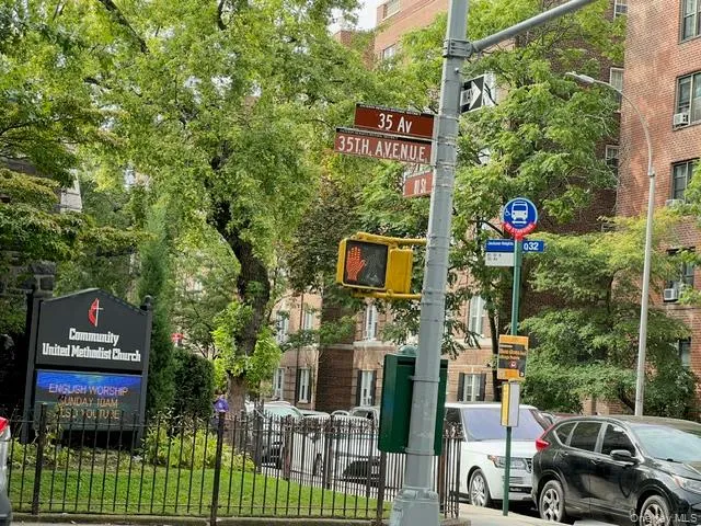 a view of a street with sitting area