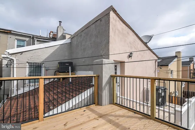 a view of a houses from balcony