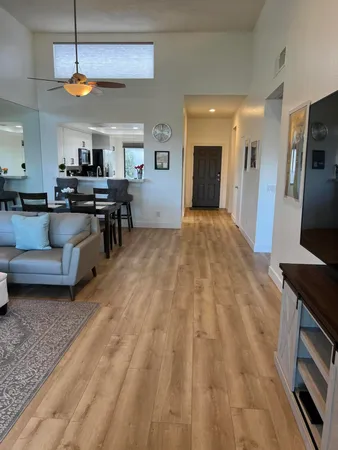 a view of kitchen and dining room with furniture