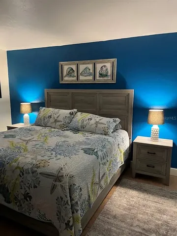 a dining room with a table and chairs in it