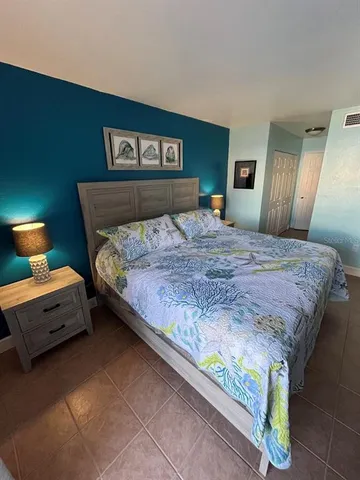 a kitchen with a sink and a stove top oven