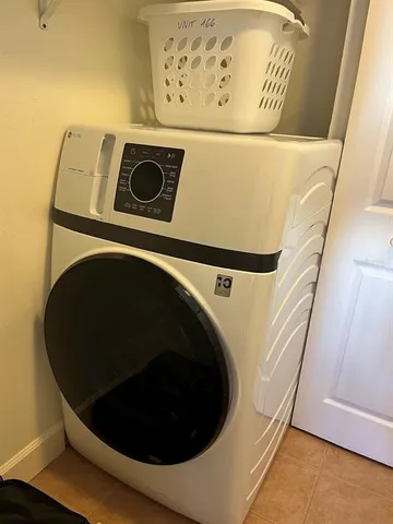 a view of a pathway of a garden with wooden floor